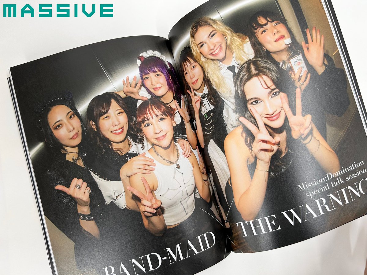 Open magazine featuring a group of women with 'MASSIVE' branding at the top.