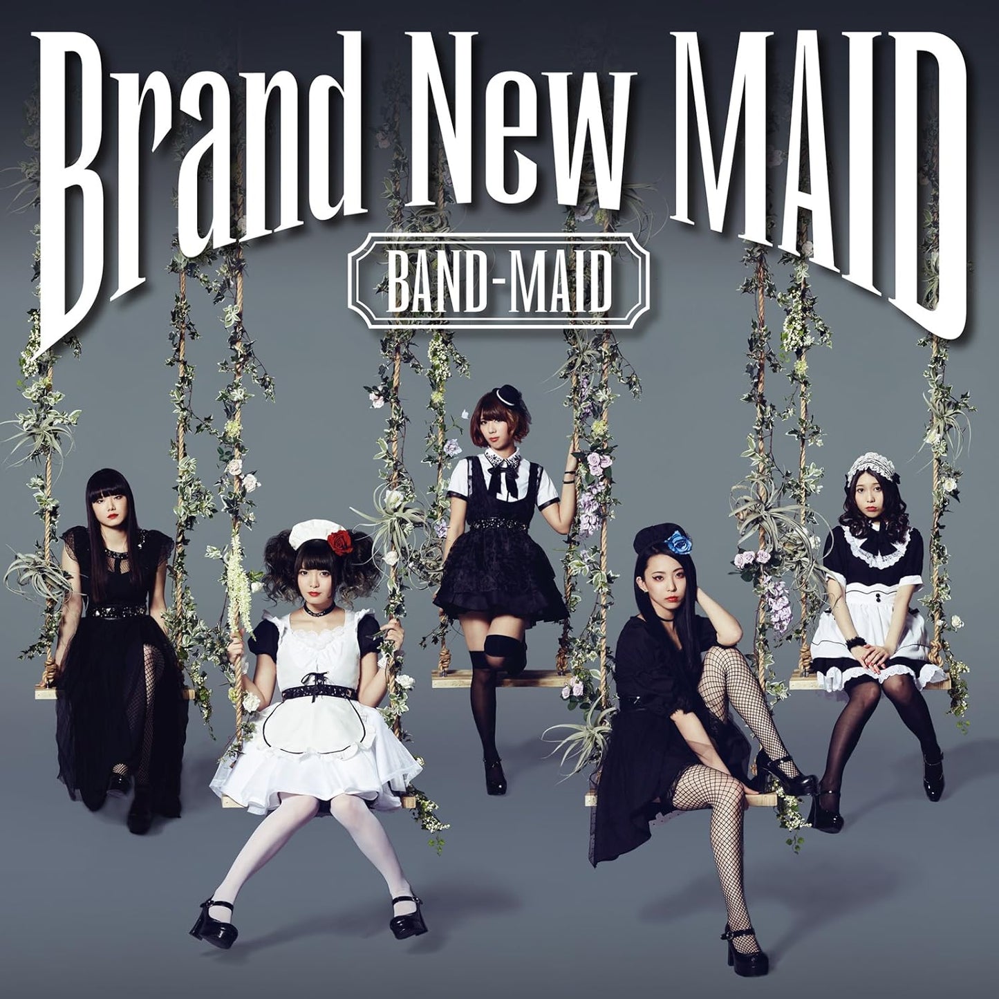 Promotional image for 'Brand New Maid' featuring five women in maid outfits on swings against a gray background.