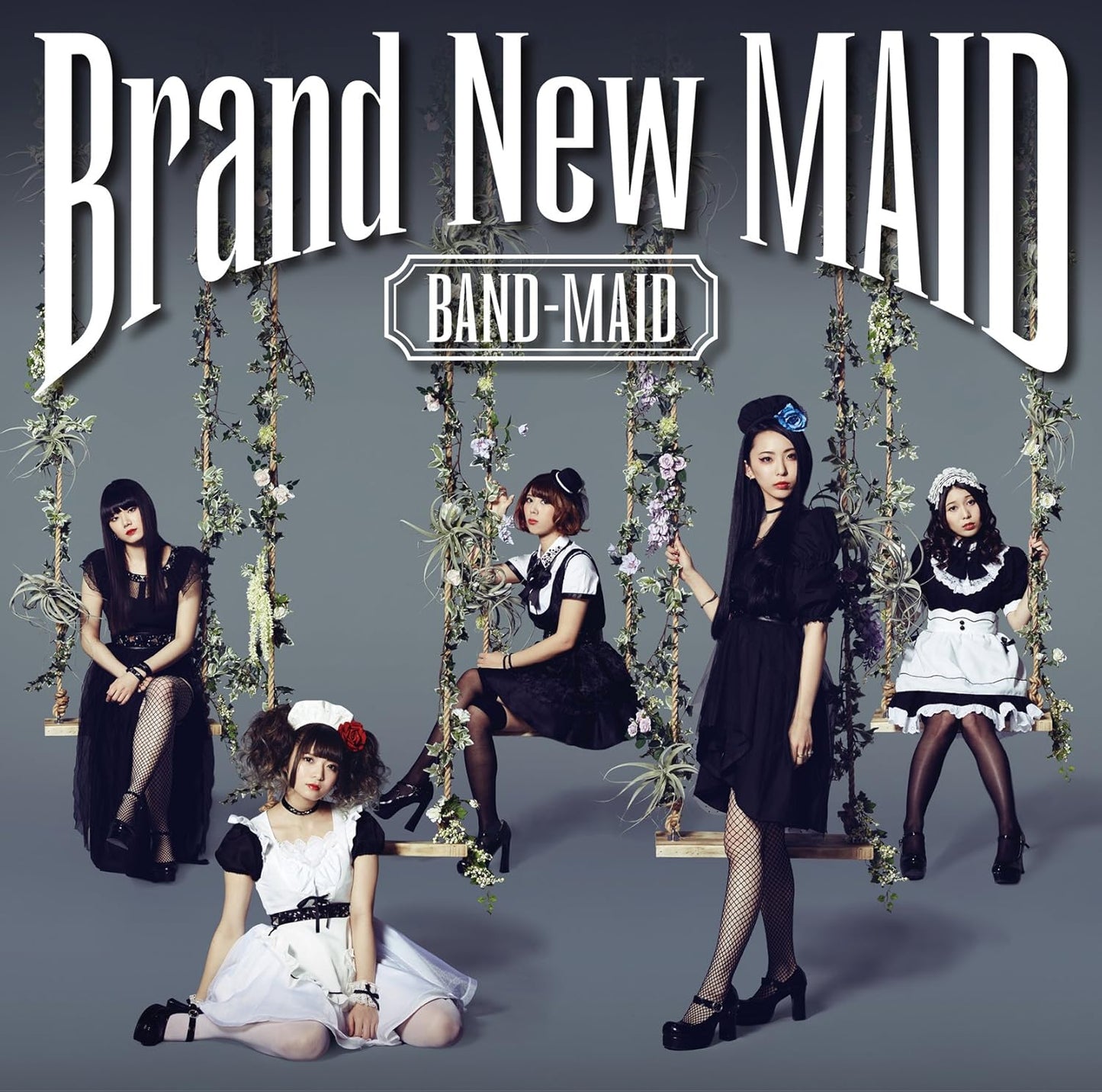 Promotional image for 'Brand New Maid' featuring five women in maid outfits against a gray background.